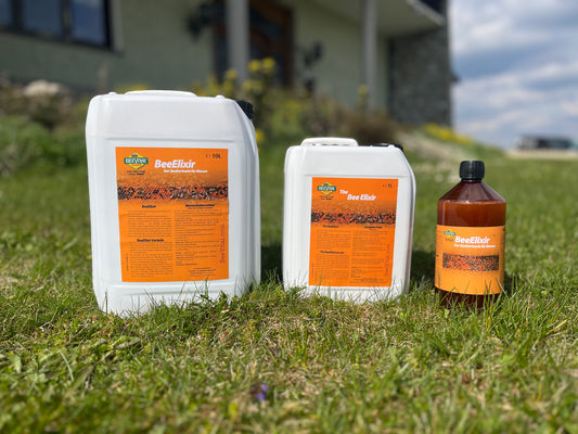 Beeelixir 1-litre bottles, 5 and 10 liters canister on the grass